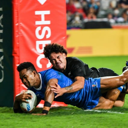 Samoa’s Steve Onosai scores a try against New Zealand on the first day of the 2022 Hong Kong Sevens. Photo: AFP