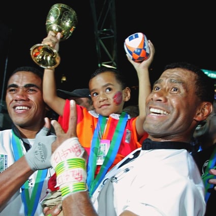 Fiji’s Waisale Serevi (right) celebrates with his son after winning the 2005 Rugby World Cup Sevens in Hong Kong. Photo: AP