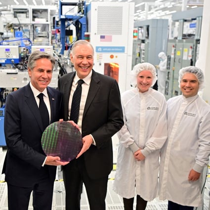 US Secretary of State Antony Blinken and Applied Materials CEO Gary Dickerson hold a 12-inch silicon wafer at the company’s facility in Santa Clara, California, on October 17, 2022. Photo: Reuters