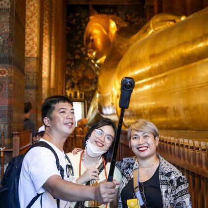 Tourists visit a temple in Bangkok, Thailand, on November 4. Photo: EPA-EFE