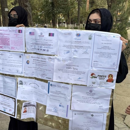Afghan women hold their educational documents during a protest as they demand the Taliban government provide them with job opportunities in Kabul, Afghanistan, on October 31. The Taliban have banned women from many government jobs and forbidden secondary school education for girls.  Photo: EPA-EFE