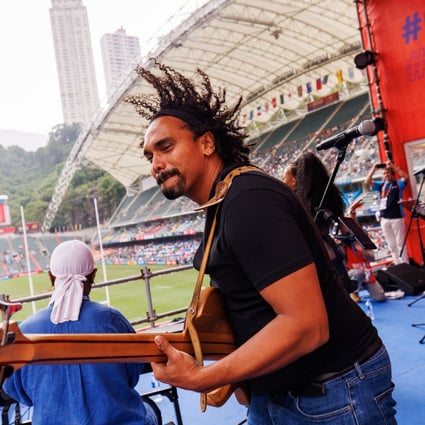 Eli Zaelo and the United Band perform during the Day 3 of the 2022 Hong Kong Sevens. Photo: Sunny Hon/Ike Images