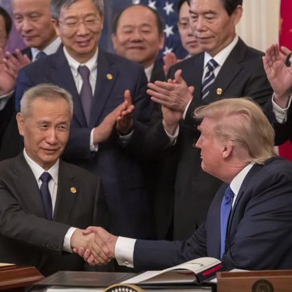 Vice-Premier Liu He shakes hands with then US president Donald Trump at the White House in January 2020, when they signed a trade agreement. Photo: EPA-EFE