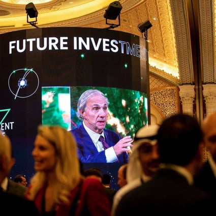 A screen broadcasts Ray Dalio, billionaire and founder of Bridgewater Associates as he speaks during an investment conference in Saudi Arabia in October 2022.Photo: Bloomberg