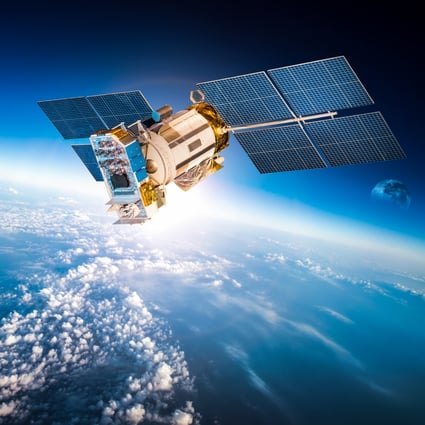 A satellite orbits Earth. Photo: Shutterstock