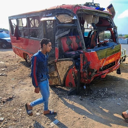 A damaged minibus that was pulled out of a canal following a crash in the village of al-Dayris near the Nile Delta city of Mansoura in Egypt on Saturday. Photo: AFP