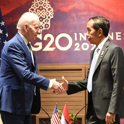 Indonesia’s President Joko Widodo shakes hands with US President Joe Biden on the sidelines of a series of activities at the G20 Indonesia Summit on November 14, 2022. Photo: Reuters