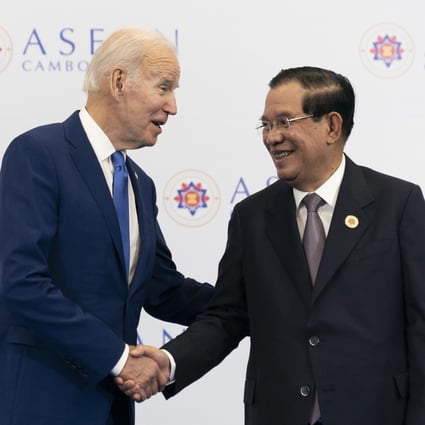 US President Joe Biden (left) shakes hands with Cambodian Prime Minister Hun Sen at the Asean summit on November 12. Photo: AP