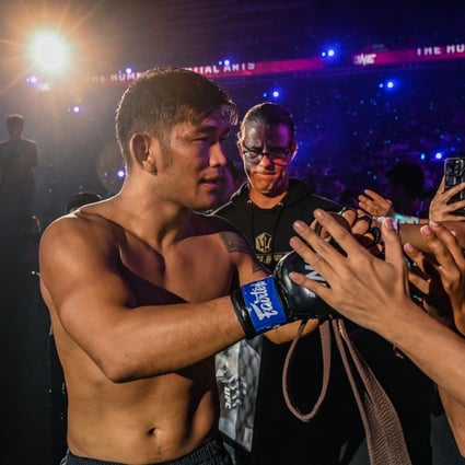 Aung La N Sang celebrates with the fans at ONE 163. Photos: ONE Championship