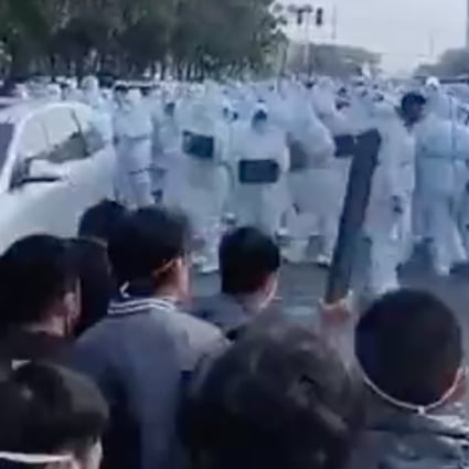 Violent clashes between workers at the Foxconn Zhengzhou plant and security staff. Photo: Weibo  