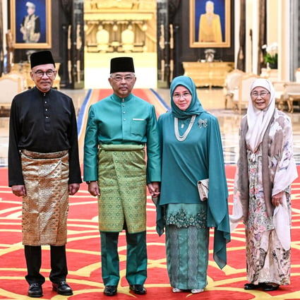 New appointed PM Anwar Ibrahim, the Malaysian king and queen, and Anwar’s wife Wan Azizah Wan Ismail after the swearing in at the National Palace. Photo: EPA-EFE