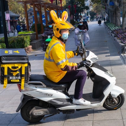 A Meituan deliver driver.  PHOTO: Getty Images