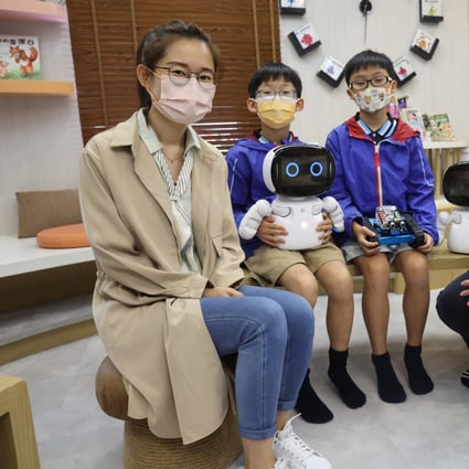 (From left) Elaine Li and her son Ian, with Hugo and his mother Hilary Lam. Photo: Edmond So