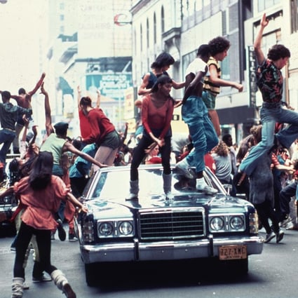 A scene from ‘Fame’, the 1980 film that starred Irene Cara (pictured on the bonnet of the dar). Photo: Handout