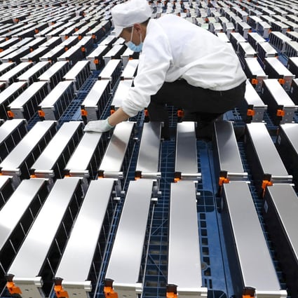 A worker checks car batteries at a factory for Xinwangda Electric Vehicle Battery in Nanjing, China, on March 12, 2021. Photo: AFP