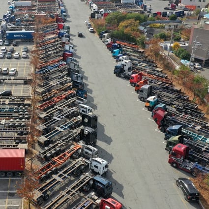 Vehicles stranded in a parking lot in South Korea as nationwide truckers strike continues. Photo: dpa