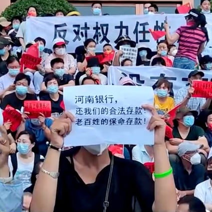 A protest over the freezing of deposits by some rural banks in Henan province in the summer. The scandal was cited as an example of problems at small local banks can spread nationwide. Photo: via Reuters  