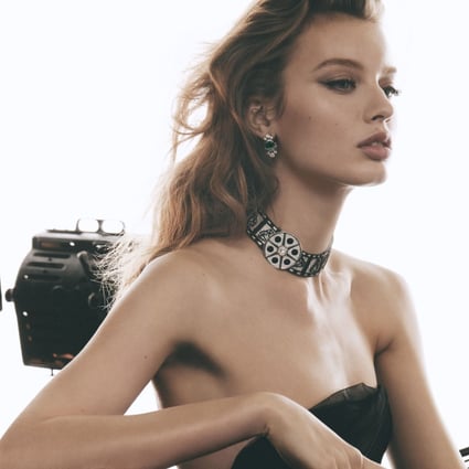 The diamond and onyx Action! necklace depicts a reel of film. Photo: Bulgari