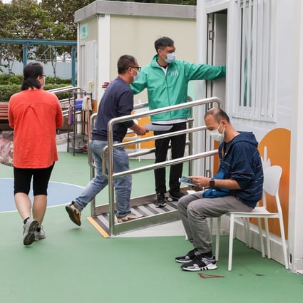 People wait to receive the BioNTech bivalent Covid-19 vaccine at Java Road Playground Community Vaccination Station in Quarry Bay. Photo: Edmond So