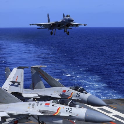 China’s J-15 features advanced flight control and radar systems, a pair of additional small front wings and other modifications allowing it to make emergency landings on the aircraft carrier deck. Photo: AP