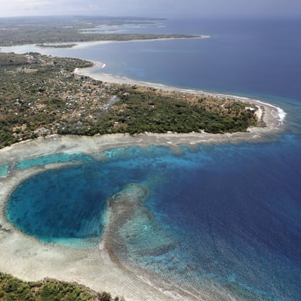 An aerial view of the coastline in Port Vila, Vanuatu in 2019. Satellite data show the sea level has risen about 6mm per year around Vanuatu since 1993, a rate nearly twice the global average, while temperatures have been increasing since 1950. Photo: Getty Images