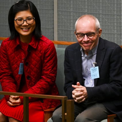 Professor Sean Turnell and his wife Dr. Ha Vu attend Question Time in the House of Representatives at Parliament House in Canberra, Australia, on Thursday. Photo: AP