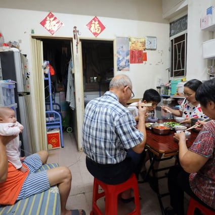 A family of six seen in their subdivided flat of around 200 sq ft, in Sham Shui Po, on November 21. Given a reasonable flat size, comfort can be a matter of how the occupant uses the space. Photo: Xiaomei Chen