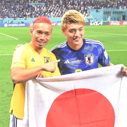 Yuto Nagatomo (left) celebrates with Ritsu Doan after Japan’s win in Doha. Photo: EPA-EFE