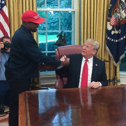 Former US President Donald Trump meets rapper Kanye West in the Oval Office of the White House in Washington in 2018. Photo: AFP via Getty Images / TNS