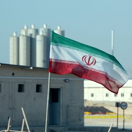 An Iranian flag in Iran’s Bushehr nuclear power plant, during an official ceremony to kick-start works on a second reactor at the facility. Photo: AFP
