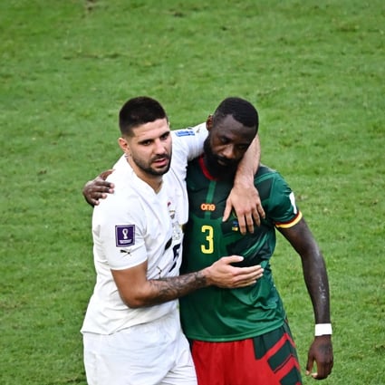 Cameroon’s defender Nicolas Nkoulou hugs Serbia’s forward Aleksandar Mitrovic at the end of a World Cup Group G match at the Al-Janoub Stadium in Al-Wakrah, south of Doha, on November 28. Photo: AFP