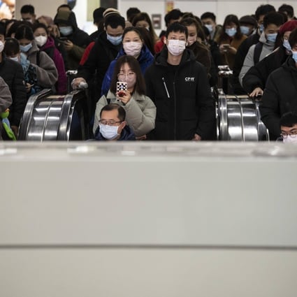 Morning commuters enter a subway station in Shanghai on December 5, 2022. Government officials over the past week signaled a transition away from the harshest Covid containment measures, which have weighed on the economy and prompted thousands of demonstrators to take to the streets to voice their anger. Photo: Bloomberg