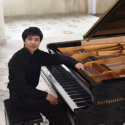 Los Angeles-born former child prodigy Kit Armstrong photographed with his grand piano in the church in northern France that has been his home since 2012. He performs in Hong Kong on December 11. Photo: Courtesy of Kit Armstrong