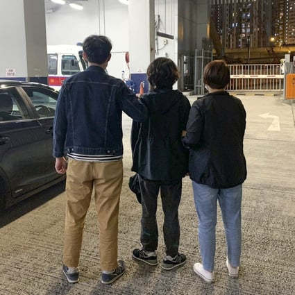 Police arrest a 28-year-old woman who has been accused of helping scammers to fleece a retiree of HK$2 million. Photo: Handout
