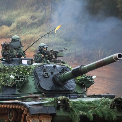 Taiwan Armed Forces soldiers crew a  battle tank during a military combat live-fire exercise in Hsinchu, Taiwan. The US Congress is considering legislation that will help Taiwan pay for arms sales from US suppliers.  Photo: Bloomberg