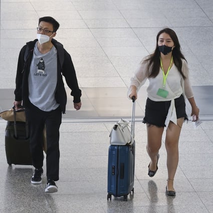 Travellers arrive at Hong Kong International Airport. Photo: SCMP