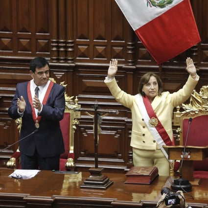 Dina Boluarte gestures after being sworn in as Peru’s new president in Lima on Wednesday. Photo: EPA-EFE
