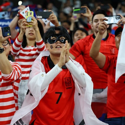 South Korea fans celebrate in the stands. Photo: Reuters