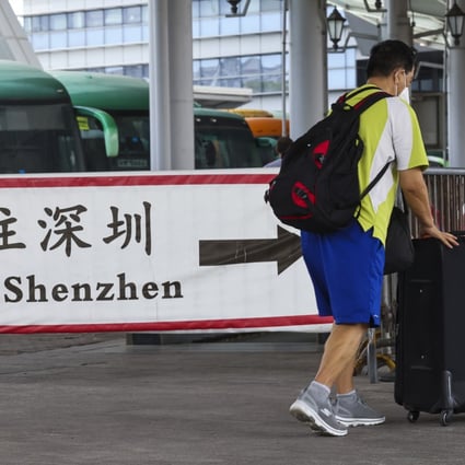 Shenzhen-bound travelers from Hong Kong at a border crossing in April. Photo: K Y. Cheng