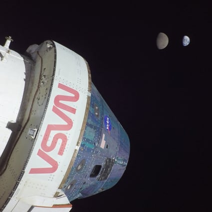 In this photo provided by Nasa, Earth and its moon are seen from the Orion spacecraft on November 28, when it reaches its maximum distance, some 432,000km away, from Earth, during the Artemis I moon mission. Orion has travelled farther than any other spacecraft built for humans. Photo: Handout via AFP