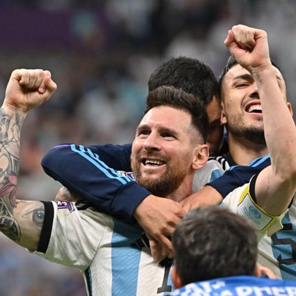 Lionel Messi celebrates after qualifying to the next round after Argentina defeats the Netherlands in a penalty shoot-out on Friday. Photo: AFP