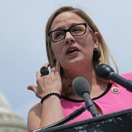 US lawmaker Kyrsten Sinema speaks at a news conference outside the Capitol in May 2014. Photo: AFP