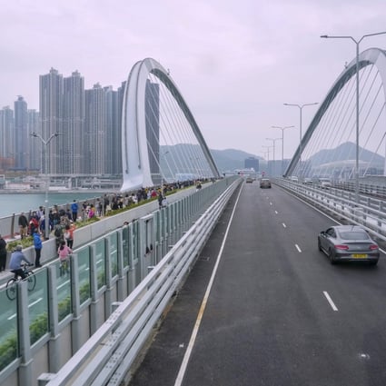 The Cross Bay Link in the New Territories, the first water crossing to feature a roadway, bicycle lane and footpath, opens to traffic on Sunday. Photo: Elson Li