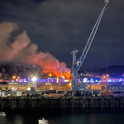 Fire and smoke in Saint Helier following an explosion on the island of Jersey, Channel Islands on Saturday. Photo: Daniel Hunt via Reuters