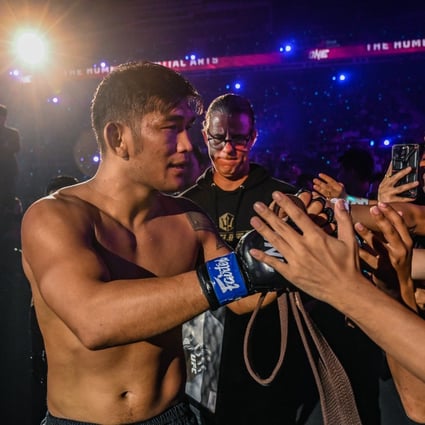 Aung La N Sang celebrates with the fans at ONE Championship 163. Photos: ONE Championship.