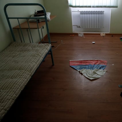 A cloth with the colours of Russian flag in a cell at a preliminary detention centre in Kherson, Ukraine. Photo: Reuters