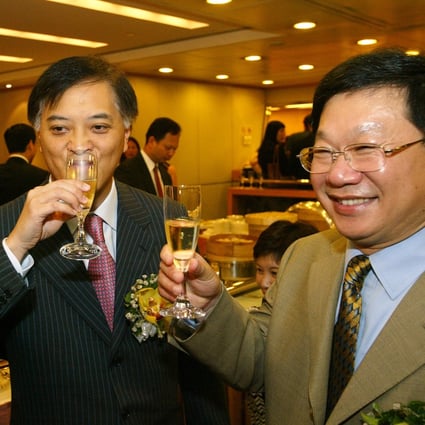 Guangzhou R&F Properties’ Vice-Chairman and President Zhang Li (right) and Chairman Li Sze-Lim (left) during the real estate developer’s listing ceremony on the Hong Kong Stock Exchange on 14 July 2005. Photo: SCMP