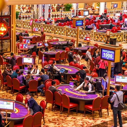 Aerial view of blackjack tables and gamblers inside The Venetian Casino in Macau. Photo: Shutterstock
