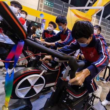 Schoolchildren at the Future Skills event enjoy the creations of VTC students. Photo: Ping On / SCMP