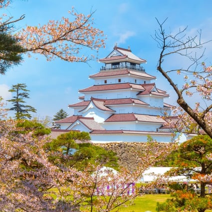 Japan’s Fukushima prefecture is home to tourist attractions such as Aizuwakamatsu Castle and springtime cherry blossoms. The region saw steady growth in  visitor numbers during the years following the 2011 triple disaster. Photo: Shutterstock